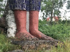 Fötterna på blå pojke